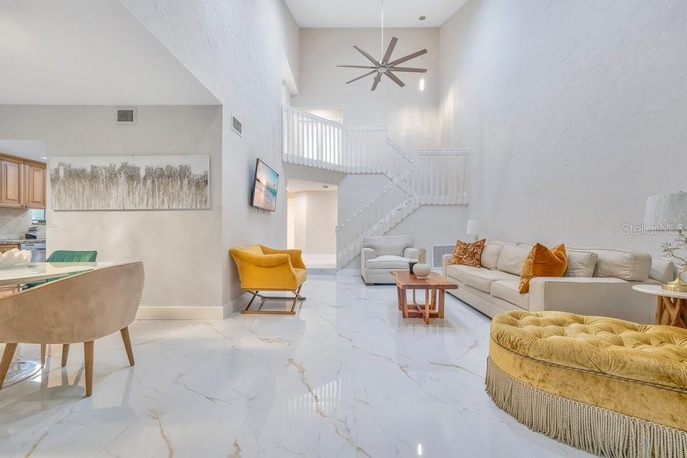 7838 La Mirada Drive Boca Raton, FL 33433 - Photo 20 of 43 a living room with furniture and a couch