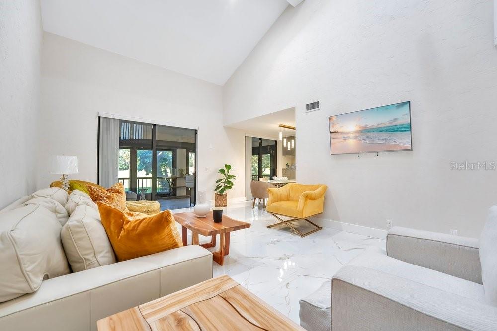 7838 La Mirada Drive Boca Raton, FL 33433 - Photo 21 of 43 a living room with furniture and couch