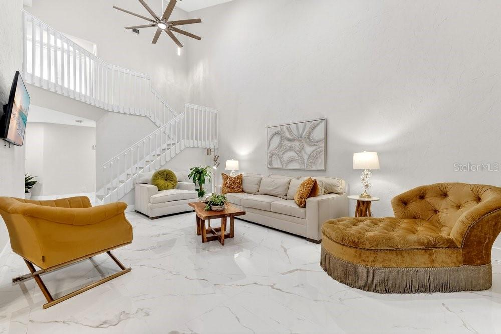 7838 La Mirada Drive Boca Raton, FL 33433 - Photo 23 of 43 a living room with furniture and a couch