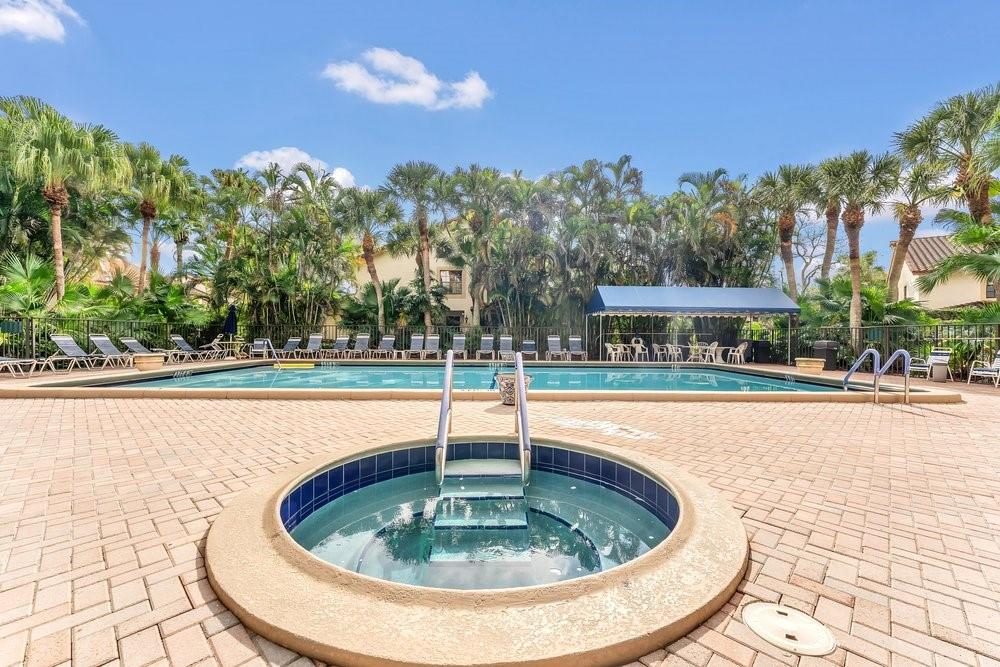 7838 La Mirada Drive Boca Raton, FL 33433 - Photo 38 of 43 a swimming pool with outdoor seating and yard