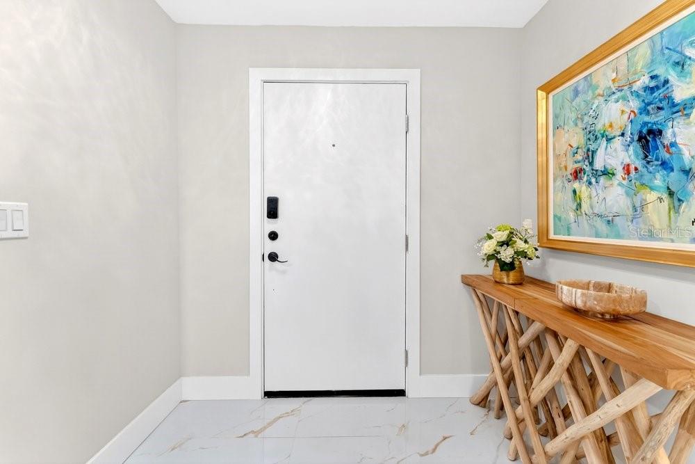 7838 La Mirada Drive Boca Raton, FL 33433 - Photo 6 of 43 a dining room with furniture and wooden floor