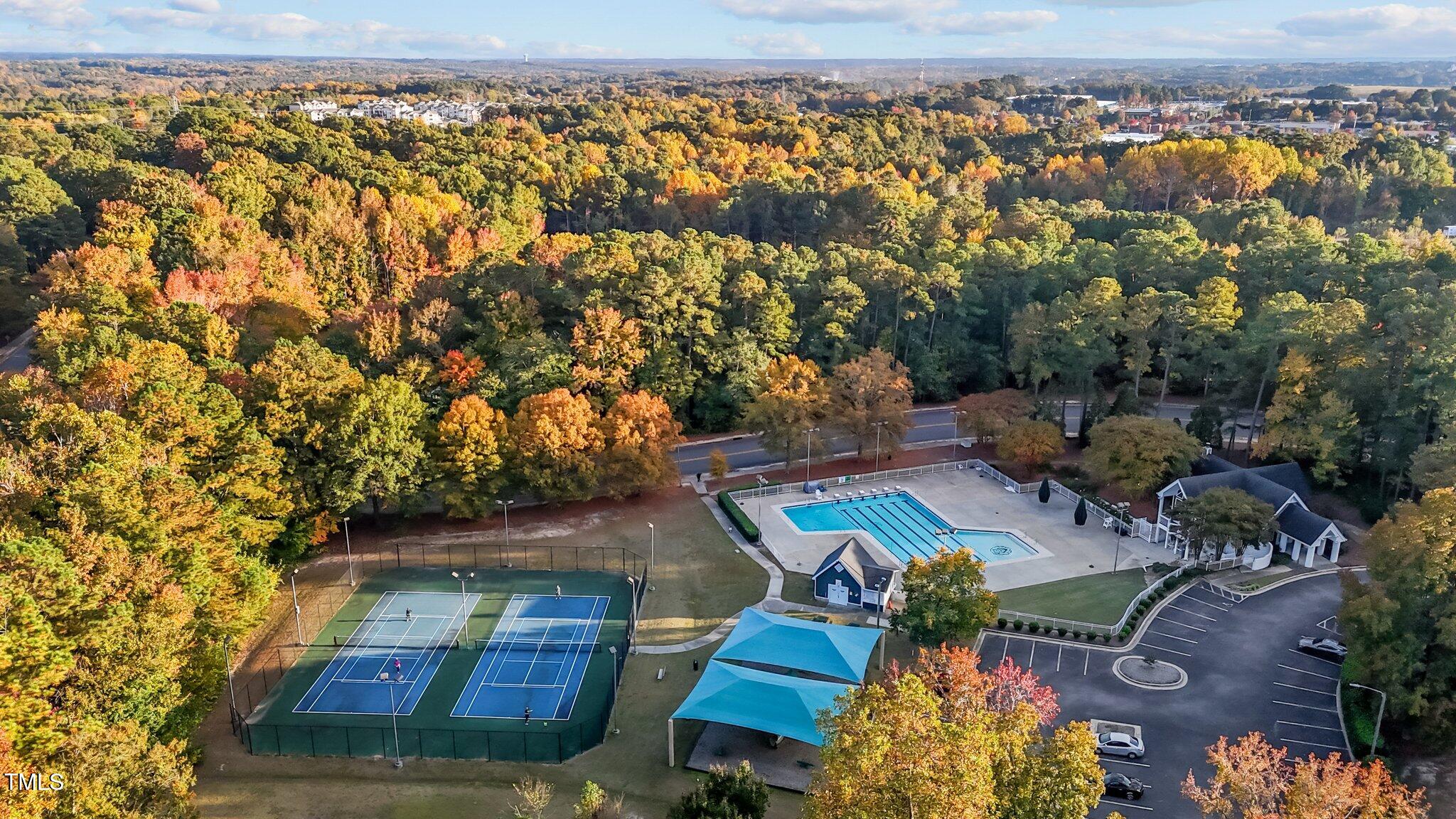 2160 Persimmon Ridge Drive Raleigh, NC 27604 - Photo 13 of 16 an aerial view of a house with a garden and lake view