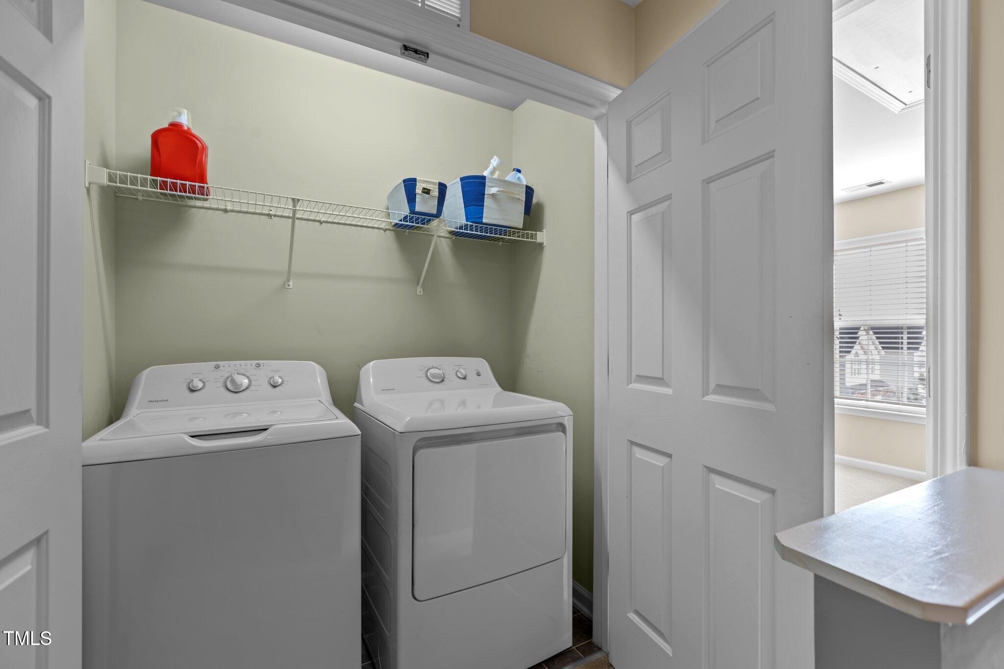 2160 Persimmon Ridge Drive Raleigh, NC 27604 - Photo 8 of 16 a utility room with dryer and washer