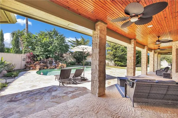 a view of a backyard with a patio