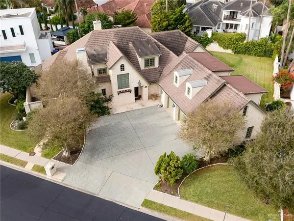 a view of houses with yard