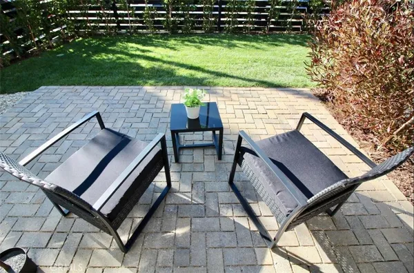 a view of sitting area in backyard