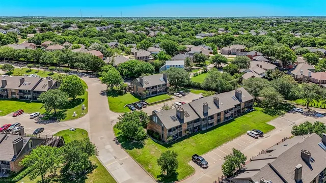 an aerial view of a house with a garden