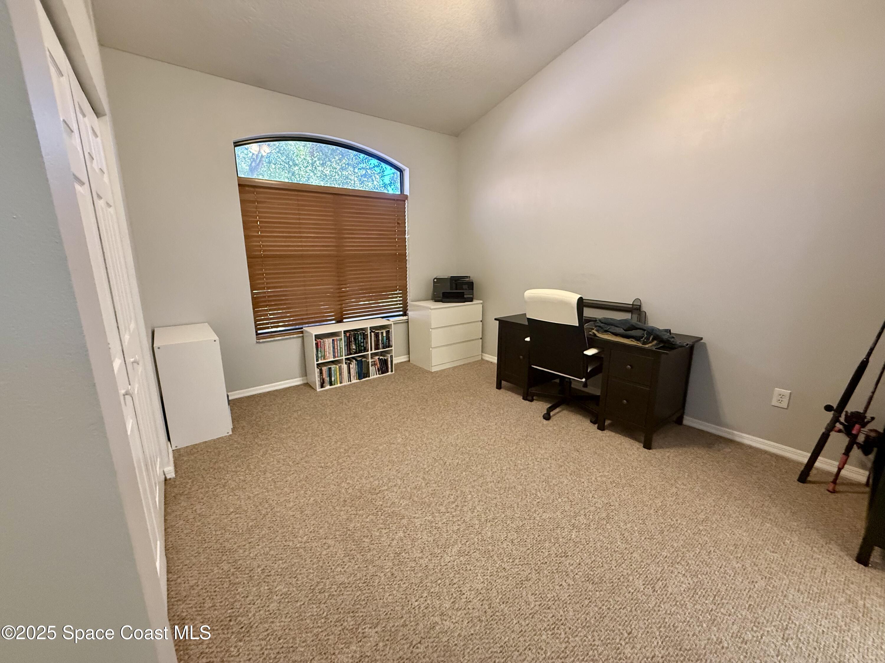 3960 Raney Road Titusville, FL 32780 - Photo 15 of 33 a room with furniture and window