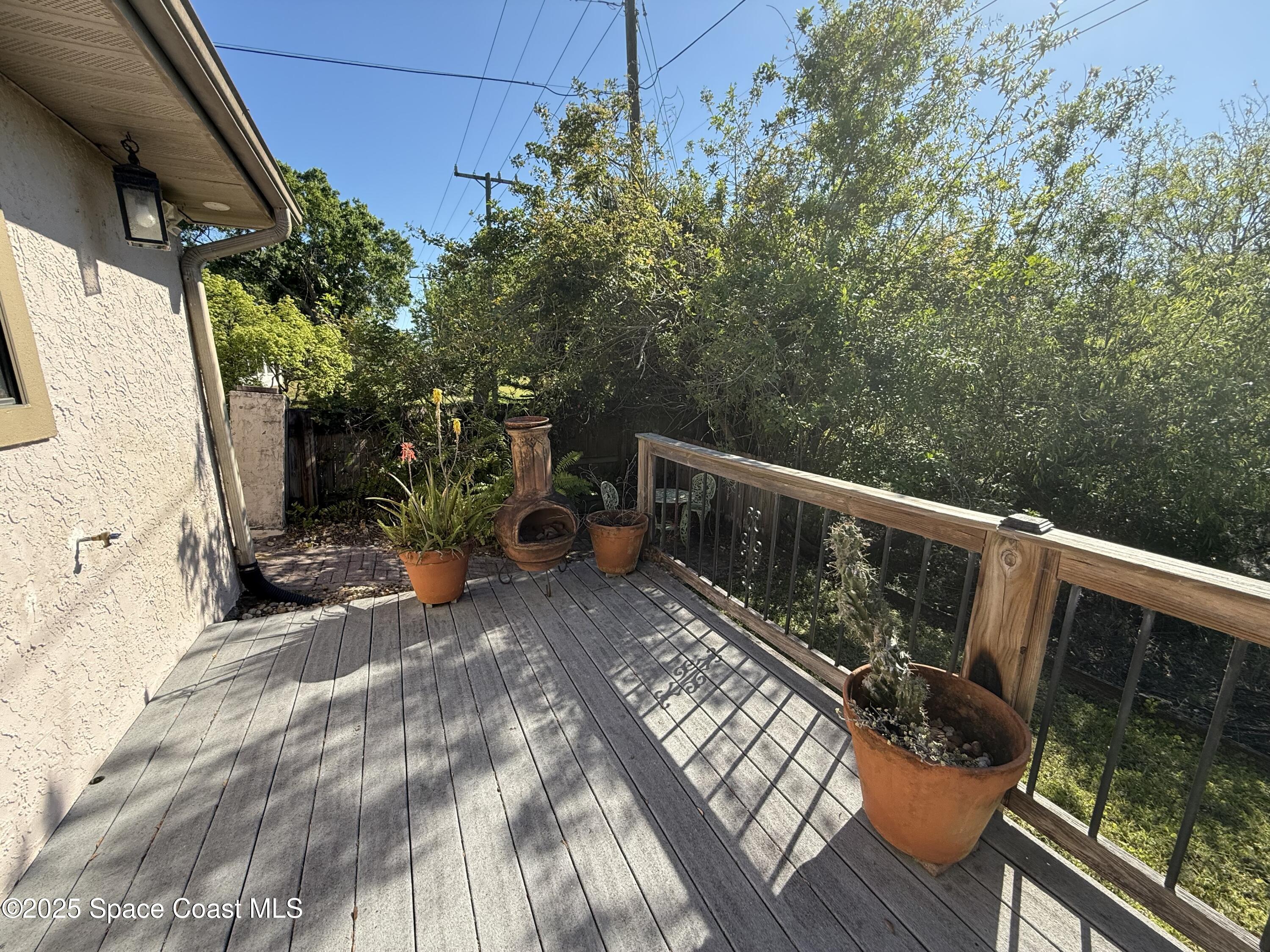3960 Raney Road Titusville, FL 32780 - Photo 25 of 33 a view of deck with wooden floor and seating space