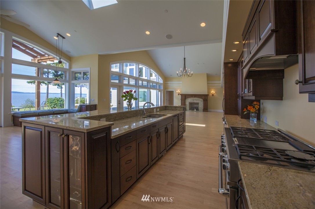 530 Bayside Road Bellingham, WA 98225 - Photo 11 of 25 a kitchen with stainless steel appliances granite countertop a stove and a sink