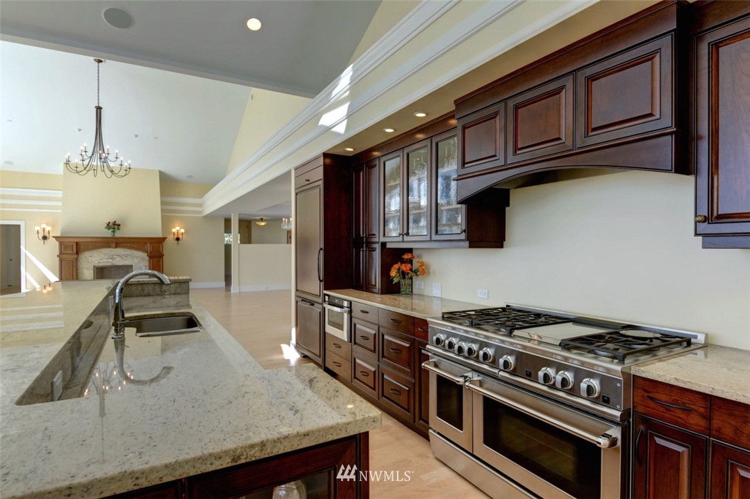 530 Bayside Road Bellingham, WA 98225 - Photo 13 of 25 a kitchen with stainless steel appliances granite countertop a stove and a sink