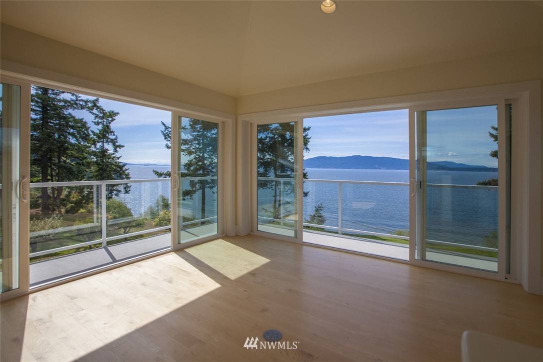 530 Bayside Road Bellingham, WA 98225 - Photo 19 of 25 a view of an empty room with sliding glass door