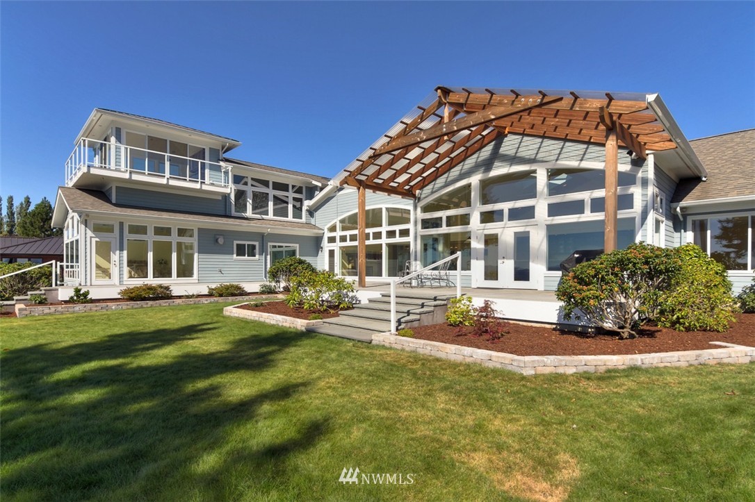 530 Bayside Road Bellingham, WA 98225 - Photo 24 of 25 a view of a house with a yard patio and sitting area
