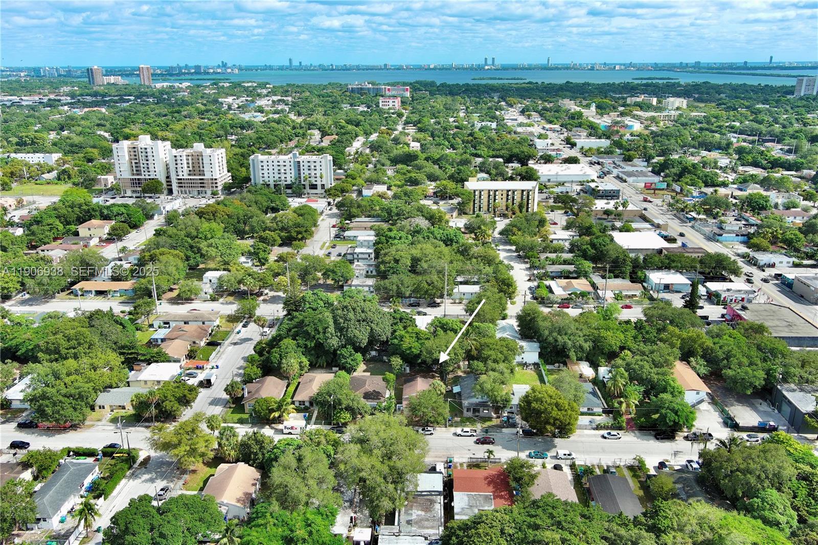 5519 Northwest 4th Avenue Miami, FL 33127 - Photo 3 of 35 an aerial view of residential houses with outdoor space and trees