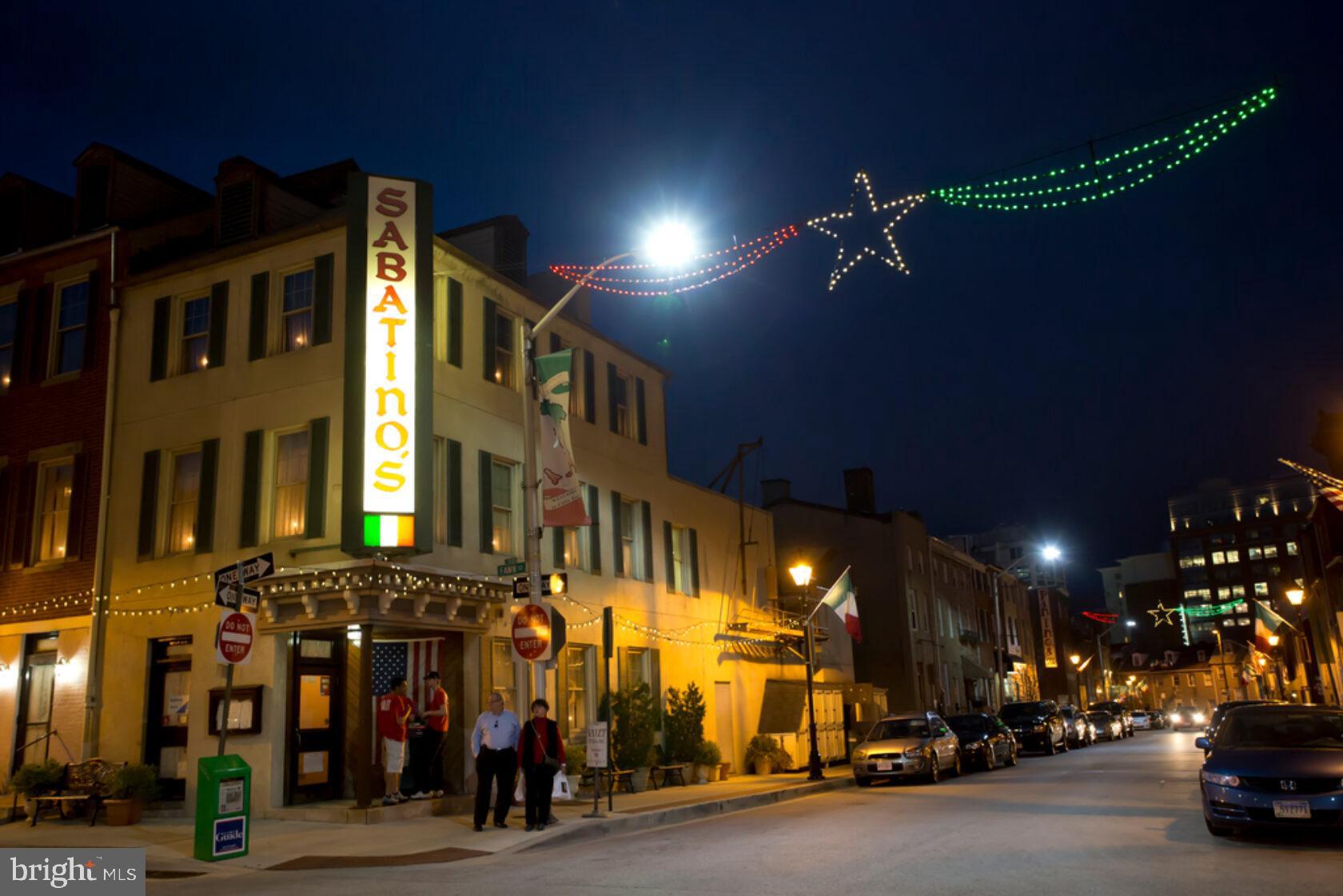 919 Stiles Street Baltimore, MD 21202 - Photo 24 of 35 Charming Italian eatery aglow at night.