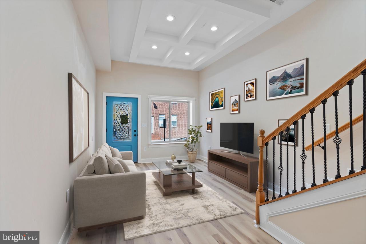 919 Stiles Street Baltimore, MD 21202 - Photo 7 of 35 Bright and inviting entryway with charm.