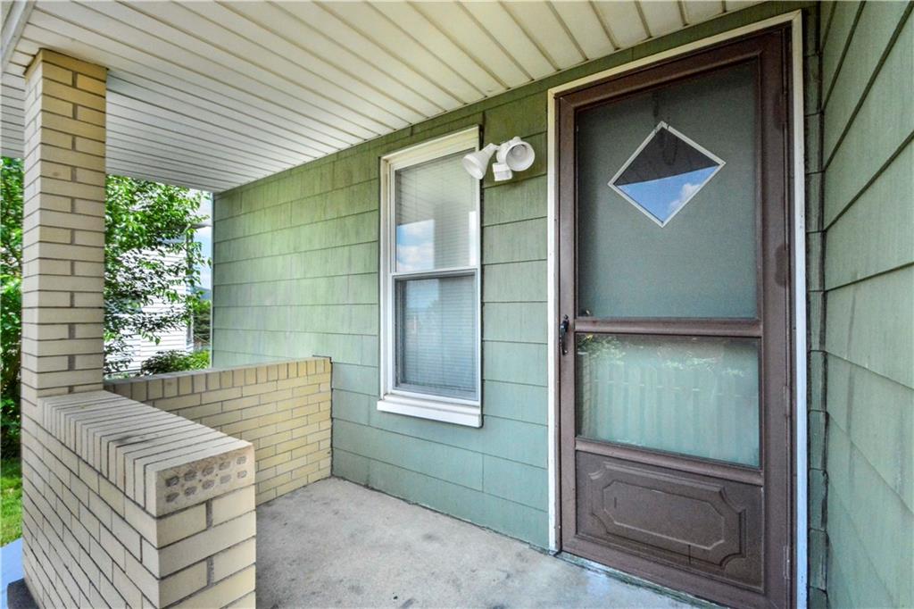 714 Main Street Coraopolis, PA 15108 - Photo 3 of 13 a view of outdoor space and front view of a house