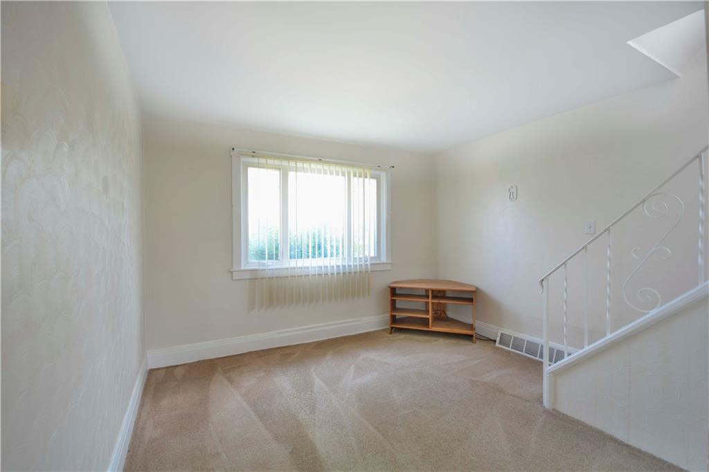 714 Main Street Coraopolis, PA 15108 - Photo 10 of 13 an empty room with a window