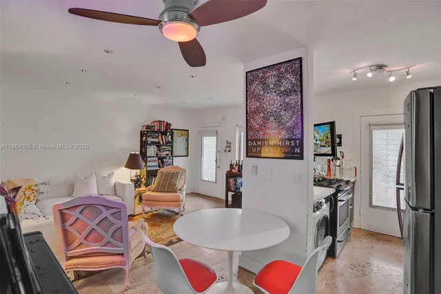 a kitchen with lots of bottles of alcohol