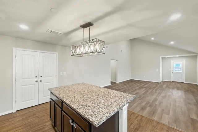 a view of kitchen counter top and microwave