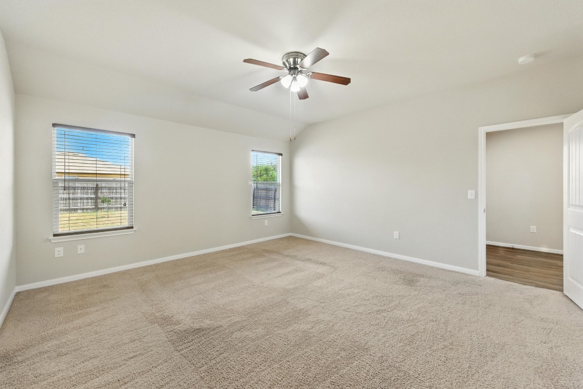 148 Alpha Kyle, TX 78640 - Photo 15 of 36 a view of an empty room with a window