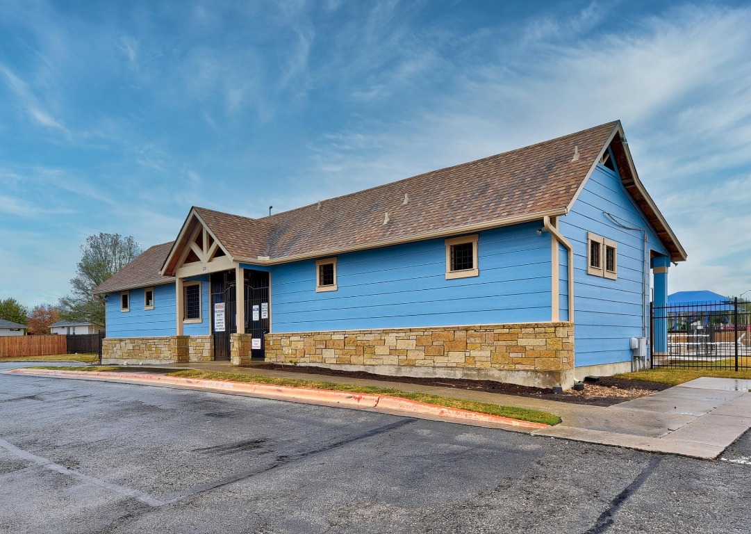 148 Alpha Kyle, TX 78640 - Photo 30 of 36 a front view of a house with a yard