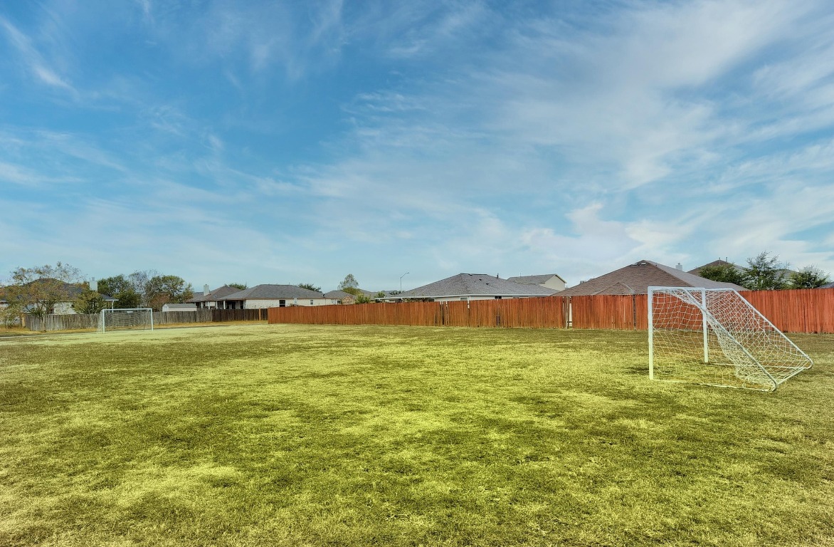 148 Alpha Kyle, TX 78640 - Photo 35 of 36 a view of a lake with a mountain