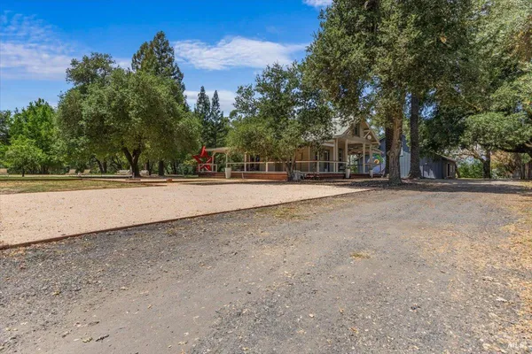 a house with trees in front of it