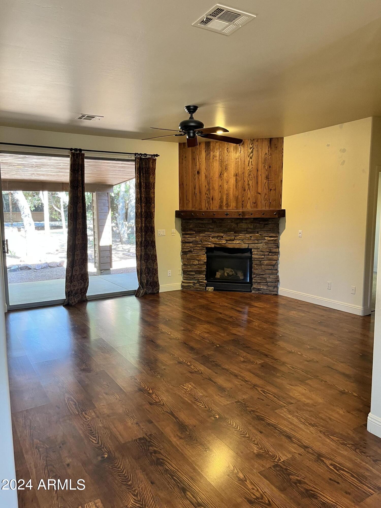 Custom stone/wood fireplace