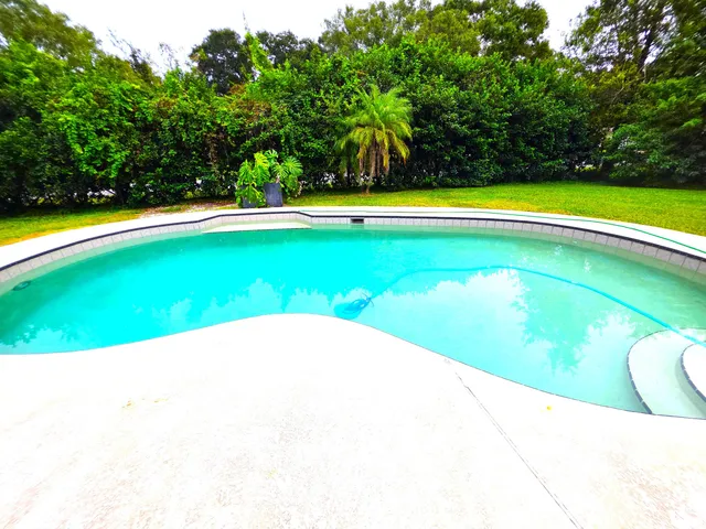 a view of an outdoor space and swimming pool
