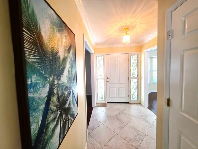 a kitchen with granite countertop lots of clutter and stainless steel appliances