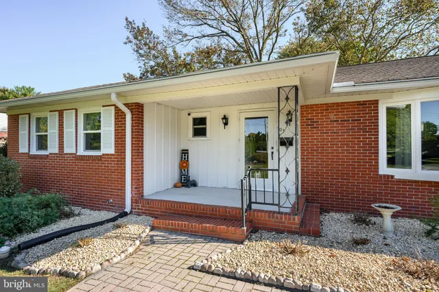 a front view of a house with a porch