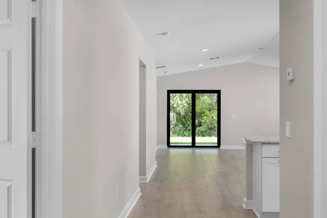 a view of an empty room with a window