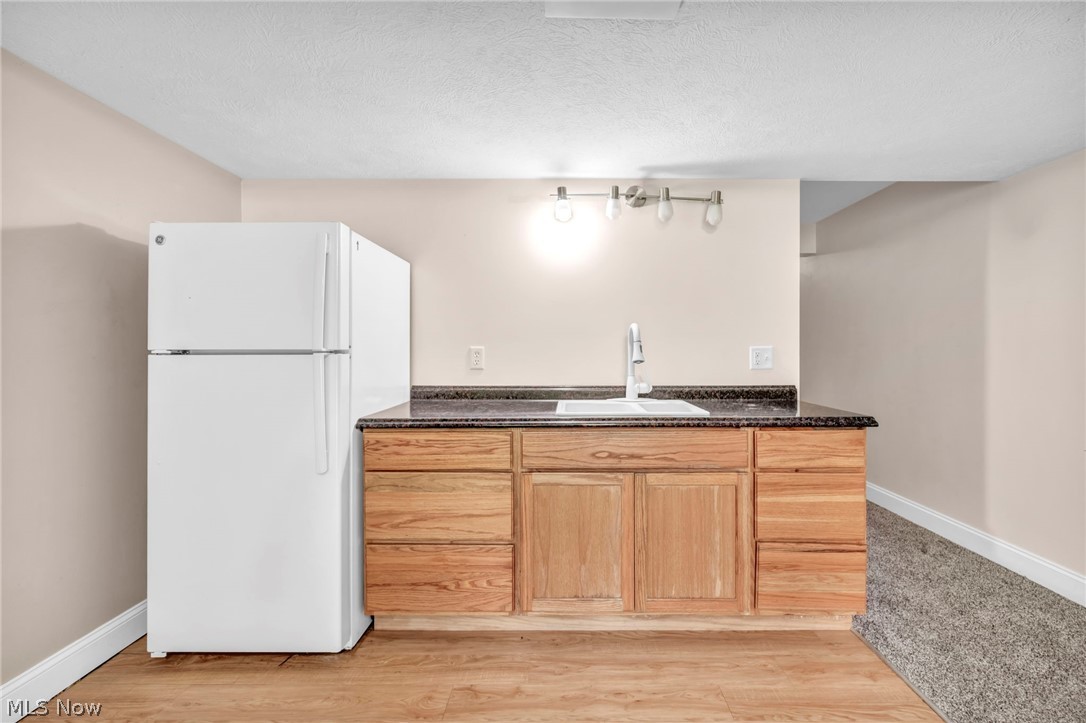 1024 St Michaels Way Madison, OH 44057 - Photo 18 of 47 Lower Level Kitchenette