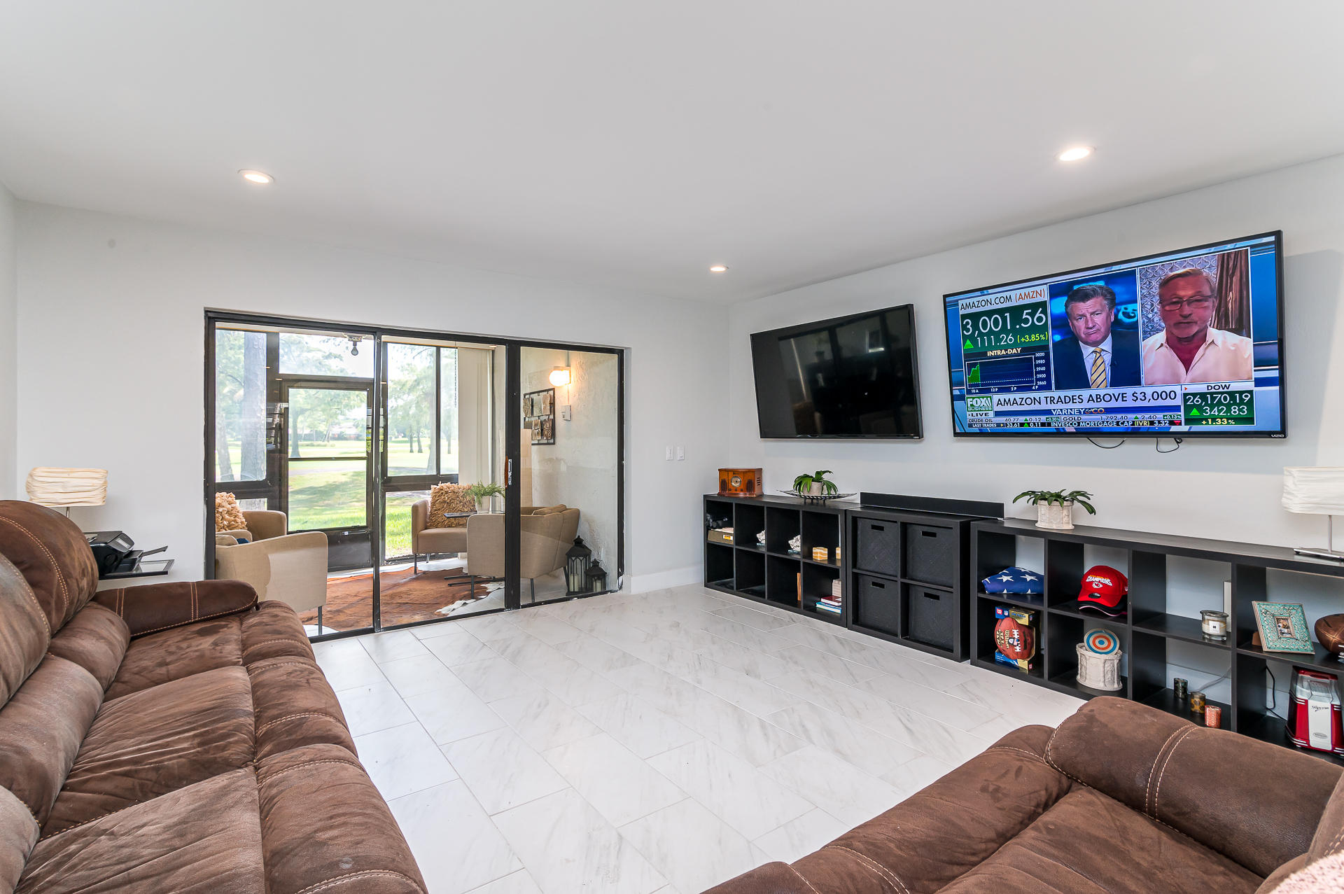 21856 Arriba Real, Unit 5E Boca Raton, FL 33433 - Photo 6 of 17 a living room with furniture and a flat screen tv