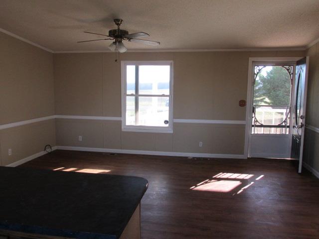 1660 Goforth Road Morrison, TN 37357 - Photo 5 of 11 a view of empty room with wooden floor and fan