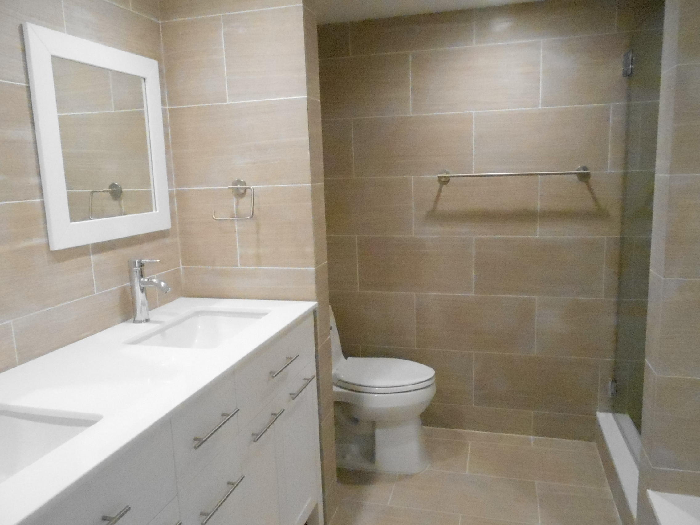 5801 North Ocean Boulevard, Unit 106 Ocean Ridge, FL 33435 - Photo 5 of 16 oceanwalk 106 master bath 031015 004.JPG