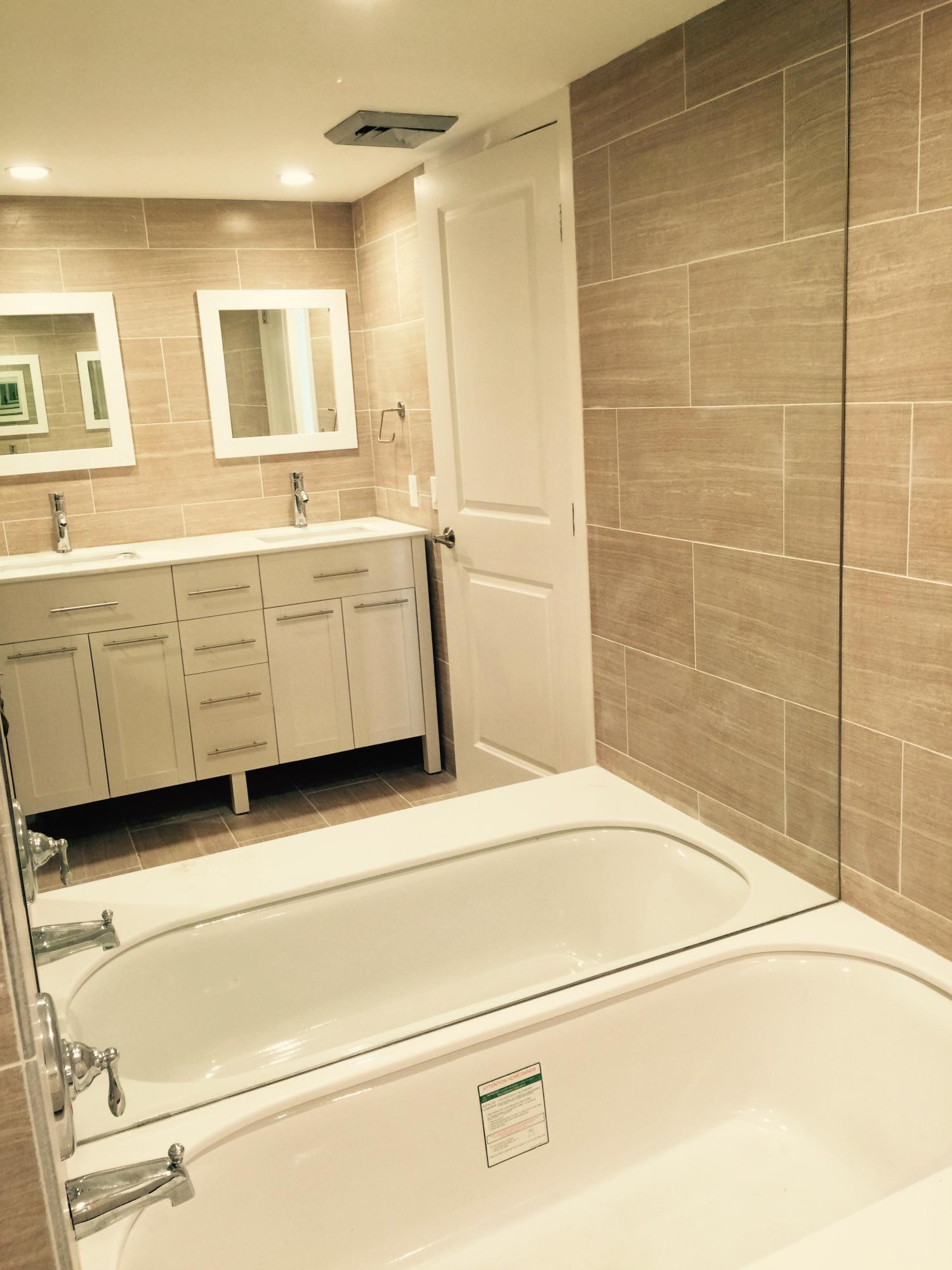5801 North Ocean Boulevard, Unit 106 Ocean Ridge, FL 33435 - Photo 6 of 16 oceanwalk 106 updated master bath.jpg