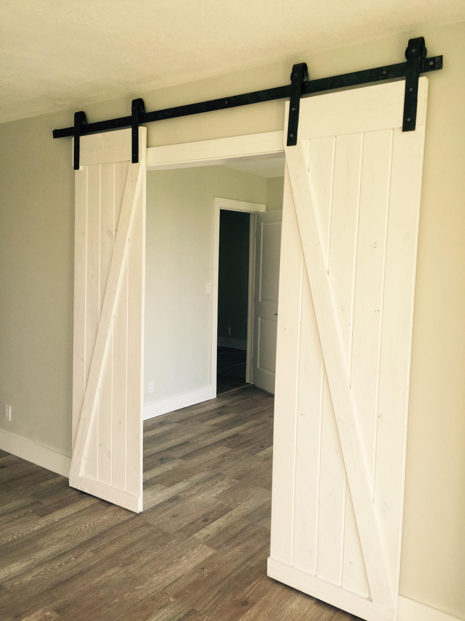 5801 North Ocean Boulevard, Unit 106 Ocean Ridge, FL 33435 - Photo 10 of 16 Oceanwalk 106 barn door updated.jpg