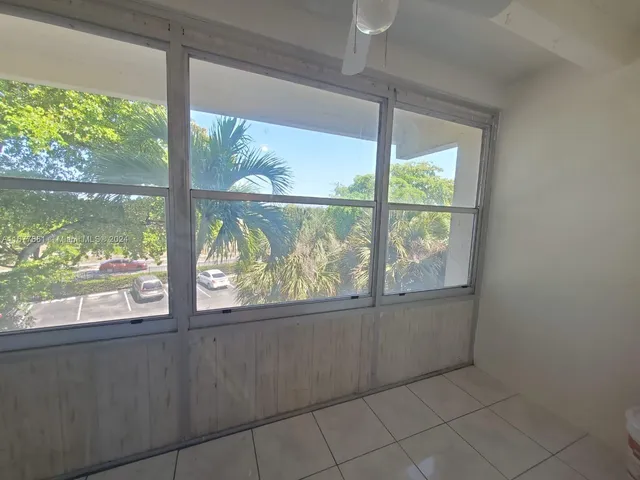 a view of a room and window