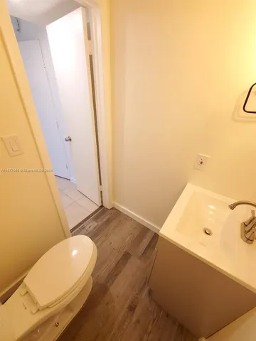 a bathroom with a tub and sink