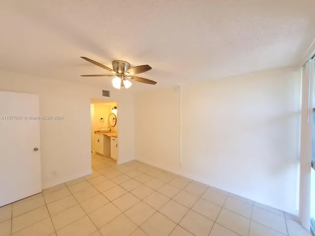 a view of a livingroom and entryway