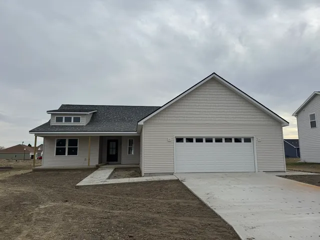 front view of a house with a yard