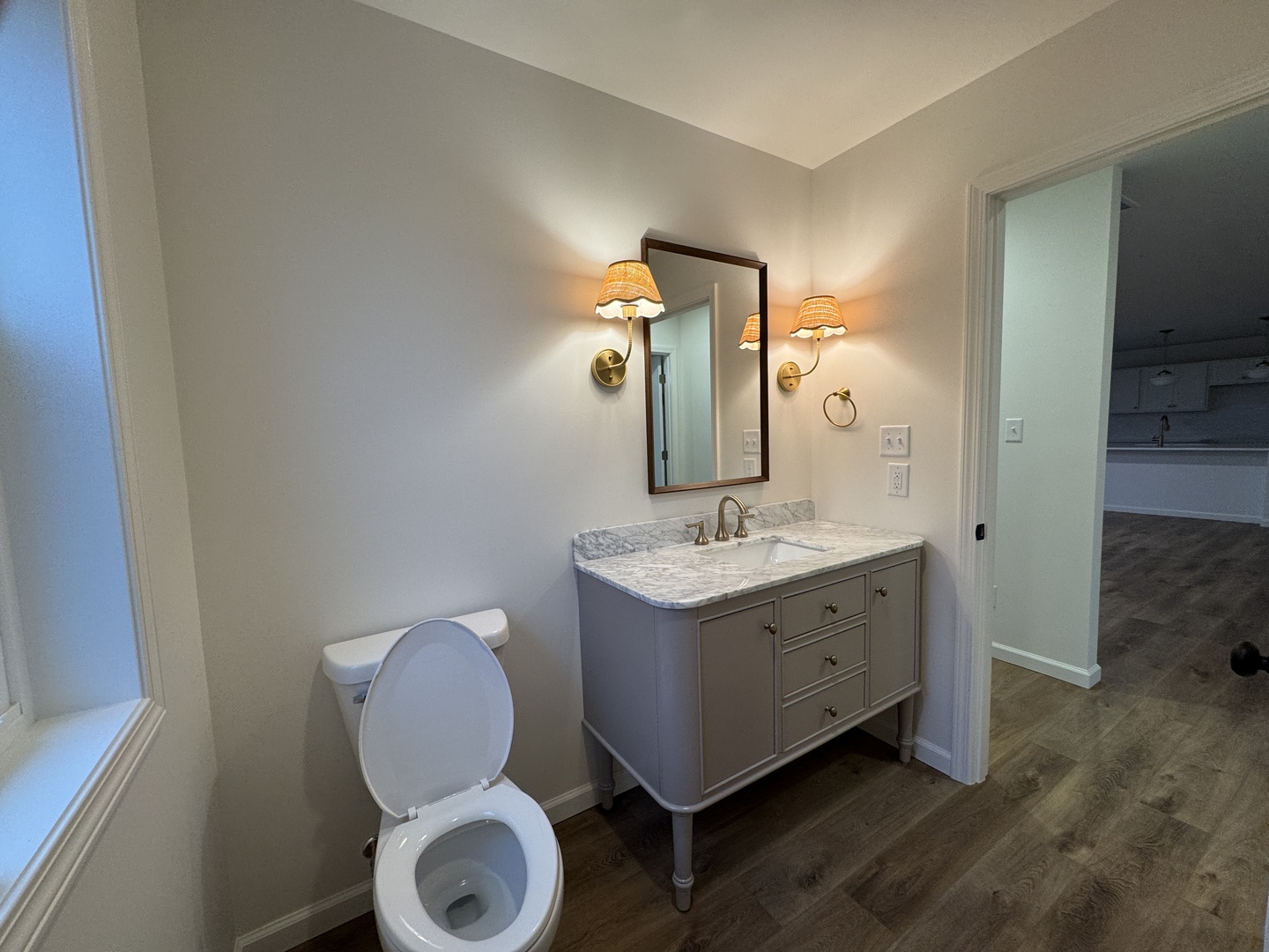 506 Patterson Drive Bloomington, IL 61701 - Photo 19 of 28 a bathroom with a toilet sink and mirror