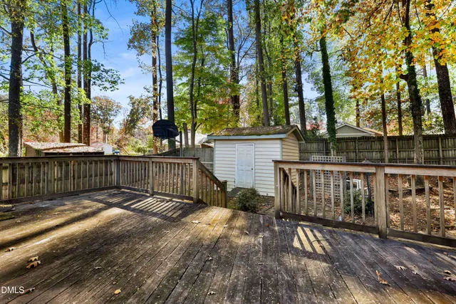 a view of pathway with a wrought fence