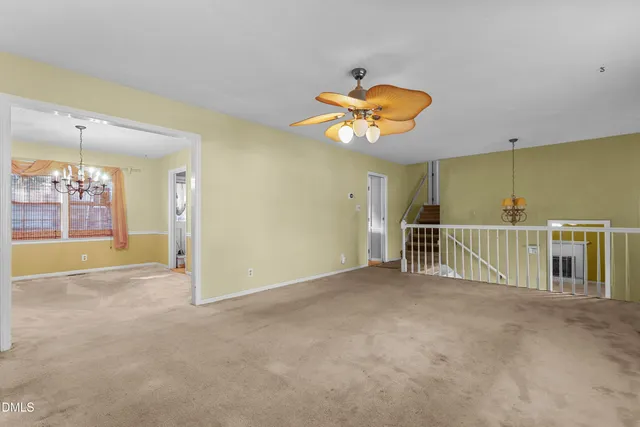 a view of a room with a large tree