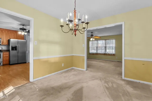 a view of a chandelier in a room