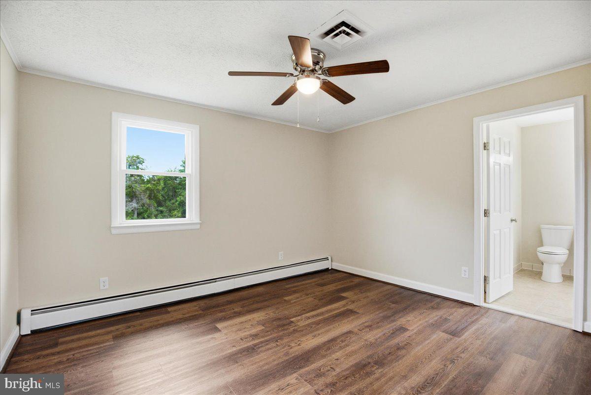 38125 Louis Thomas Road Avenue, MD 20609 - Photo 39 of 73 BEDROOM #2, NEW LVP, NEW CEILING FAN 2026 YR