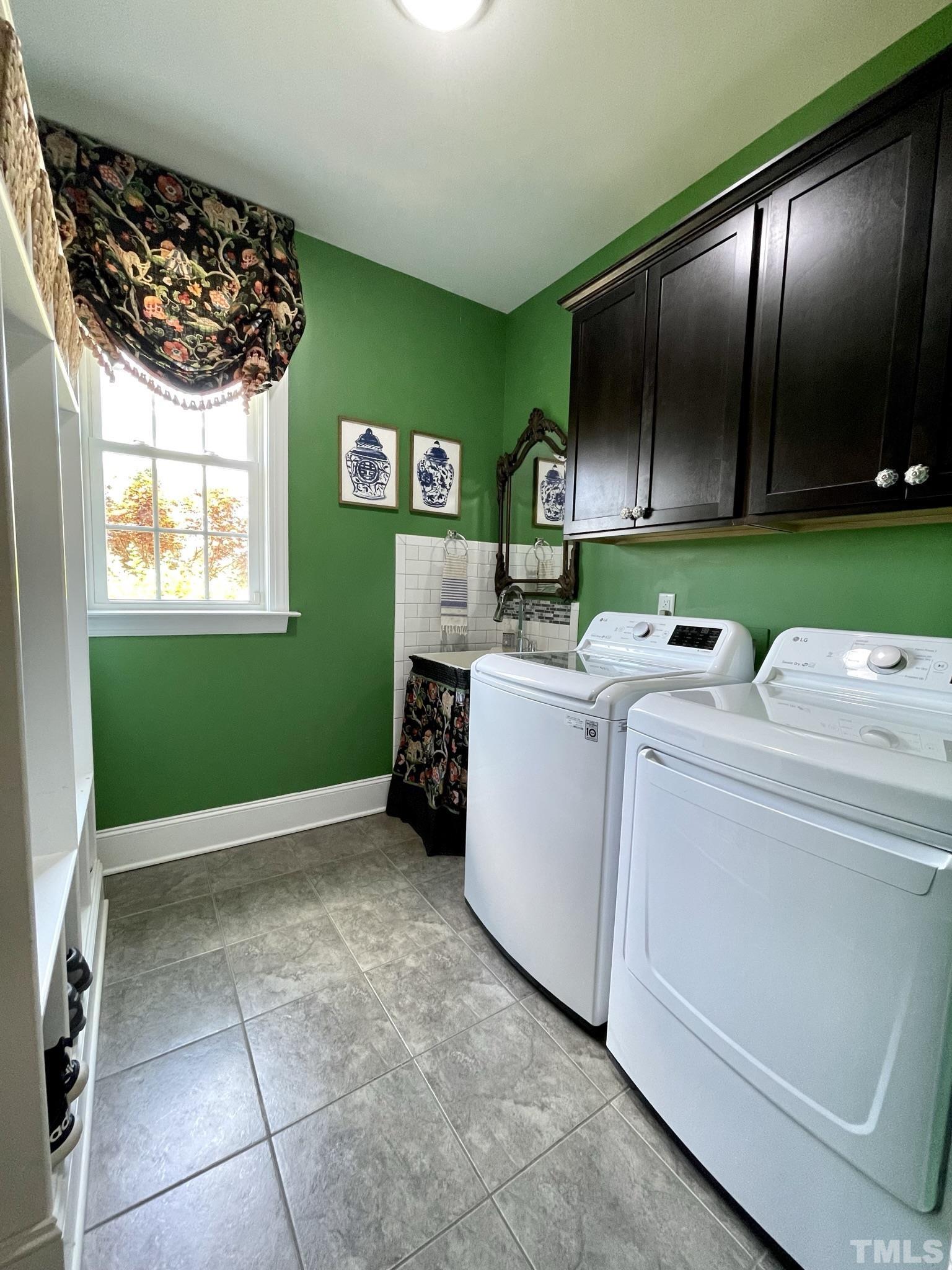 6228 Mitchell Mill Road Zebulon, NC 27597 - Photo 22 of 51 a utility room with washer and dryer