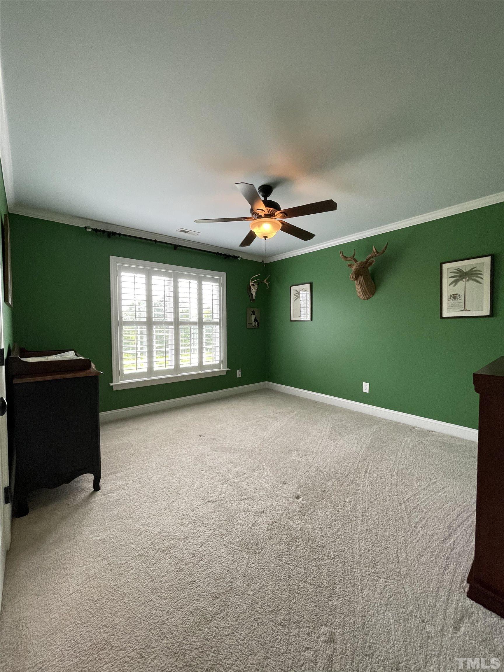 6228 Mitchell Mill Road Zebulon, NC 27597 - Photo 32 of 51 a view of a livingroom with a window